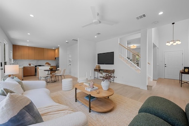 Living room featuring recessed lighting, light wo