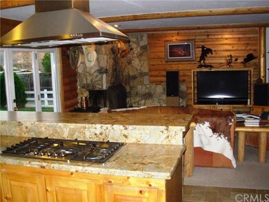 Kitchen with gas range and nice stainless steel fa