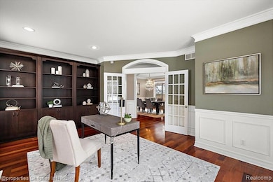 Large office/den with double doors.