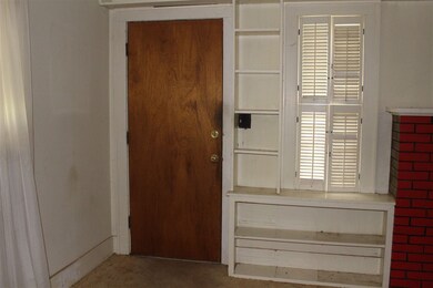 Looking at the front door from living area