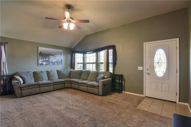 Spacious living room with plenty of natural light.