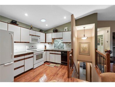 Beautiful granite countertops compliment the wood 