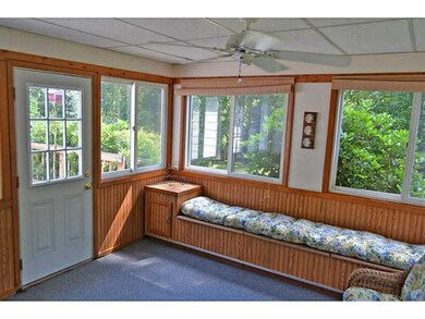 Sunroom. The sun room leads to a deck.