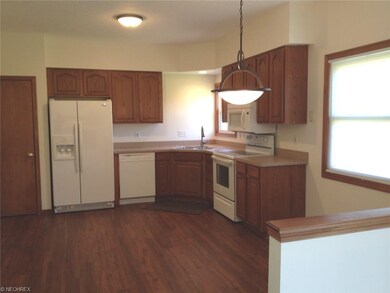 Kitchen with large area for dining.  Newer laminat