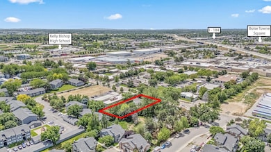 Aerial view of residential area with property parcel outlined