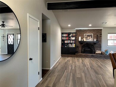 Spacious entry way leads into this beautifully rem