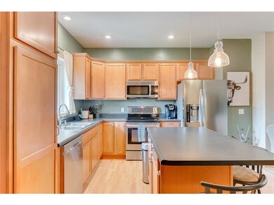 Updated stainless steel appliances and large islan