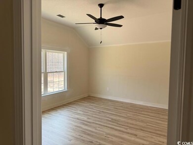 Bonus room featuring lofted ceiling, light hardwoo