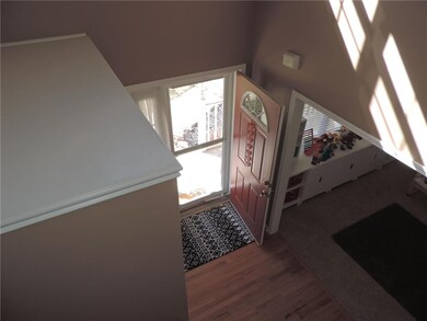 Stairway overlooking front hall
