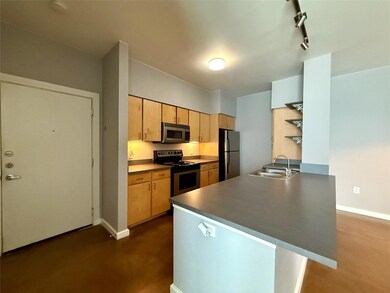 Kitchen featuring stainless steel appliances, a s