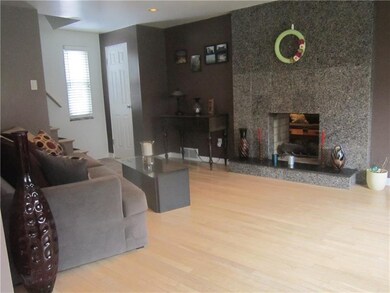 Livingroom/ 2 sided granite fireplace!