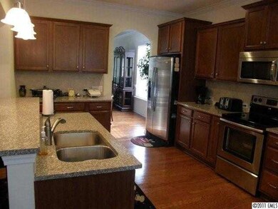 Kitchen - Granite Countertops, Stainless Steel Appliances, Maple Cabinets