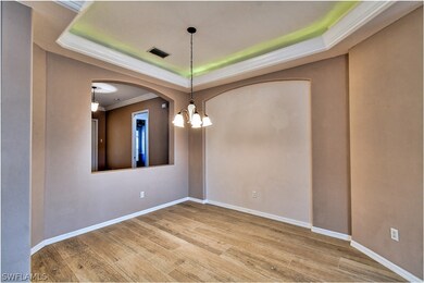 Often used as a dining area, this spot is just off of the family room and kitchen and off of the front hallway.