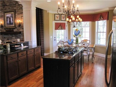 The Perfect kitchen, island and Bar top sit area open to all of the fun!