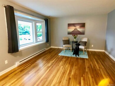 Refinished Hardwood Floors & New Bay Window