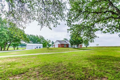 View of yard featuring a garage
