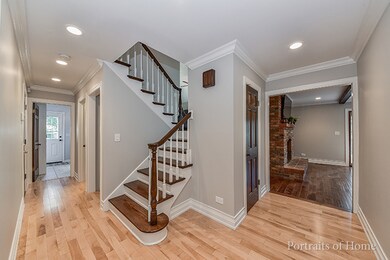 Refinished two-tone hardwood staircase with wood b