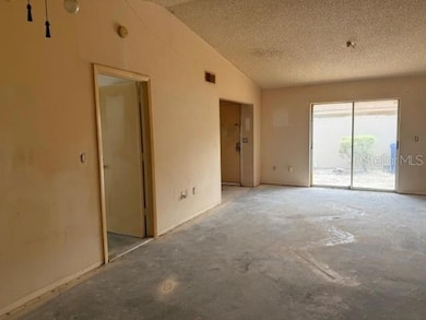 Family room with vaulted ceiling