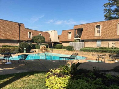 Well kept grounds, pool, parking also...