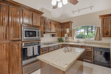 Kitchen has updated stainless appliances and gorgeous granite!