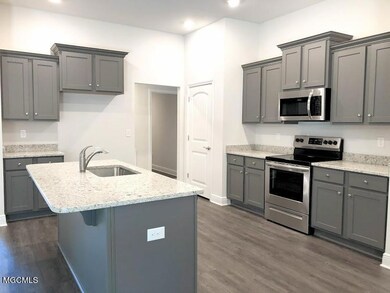 Graphite grey cabinets and dallas white