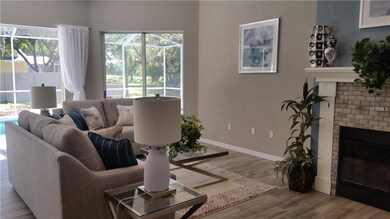 FAMILY ROOM LEADING TO THE POOL DECK