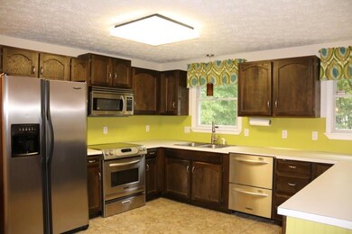 roomy kitchen with stainless appliances