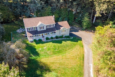 Aerial view of home and driveway