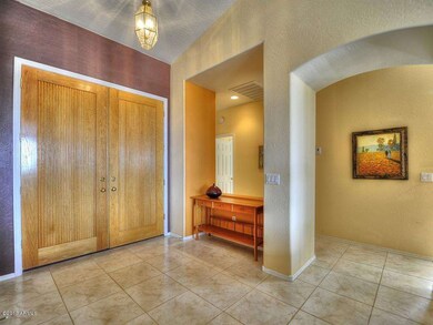 Tiled Flooring in Entry, Hall & Kitchen