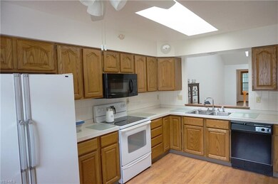 View in kitchen to pass through window to great ro