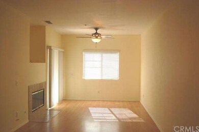 Spacious Great Room. Easy Care Laminate Flooring.  Cooling Designer Fan. New 2 Inch Blinds. Gas Fireplace For Cozy Warmth.