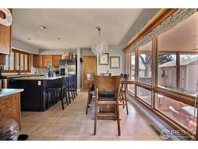 Living Room Opens Up To The Eat-In Kitchen