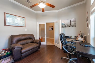 French doors allow a quiet retreat for work or computer fun!
