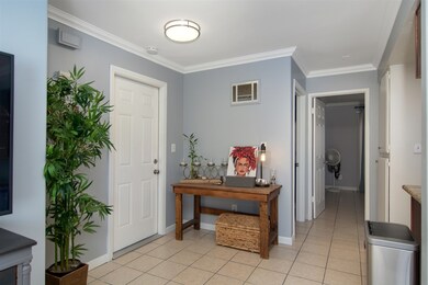 Entry from two-car garage.