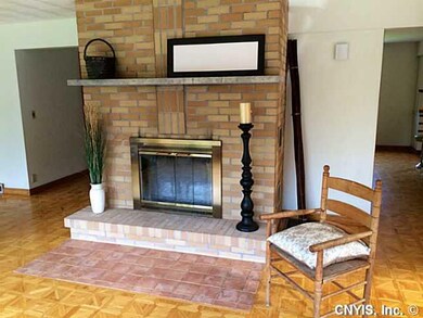 Family Room. Beautiful brick wood-burning fireplac