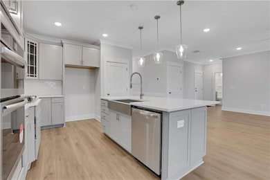 Photos are of a similar home.