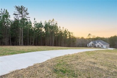 The lot is over two acres which allows deep setbac