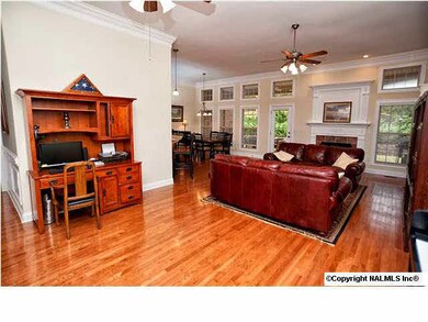 Spacious living room with hardwood floors