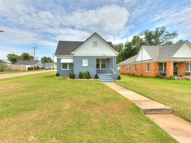 View of front of house with covered porch and a fr