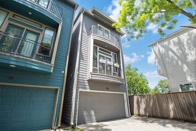 Tucked behind a shared drive, this three-story Hei