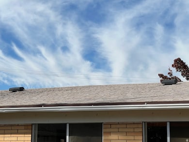 Exterior view of roof with shingles