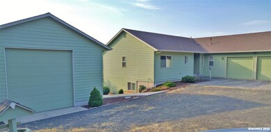 Front of House with RV Garage/Shop
