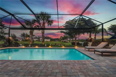 Outdoor saltwater heated pool with screened-in panoramic cage overlooking two waterways. Amazing sunset views!