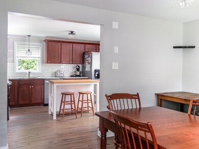 Kitchen leads into the spacious dining room.