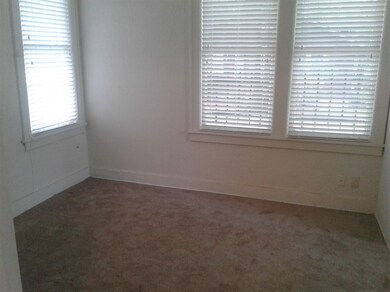 French doors open to the 9' x 15' sunroom. New car