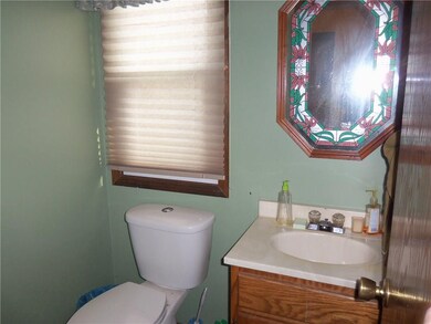 HALF BATH OFF FOYER.