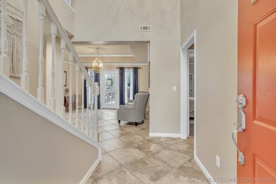 Vaulted entryway with lots of natural light.