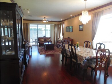 Beautifully upgraded floors, crown molding and rec