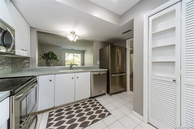Second Kitchen Photo with New Stainless Steel Appl