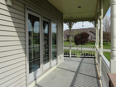 Exterior Front. Wrap Around Deck